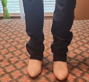 Elegant White and Black Knee-High Boots